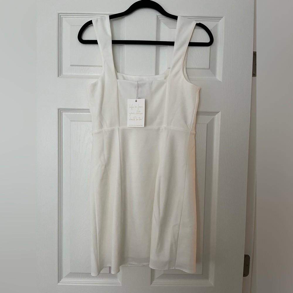 Show me your MUMU Eden Mini Dress with stretch. Never worn